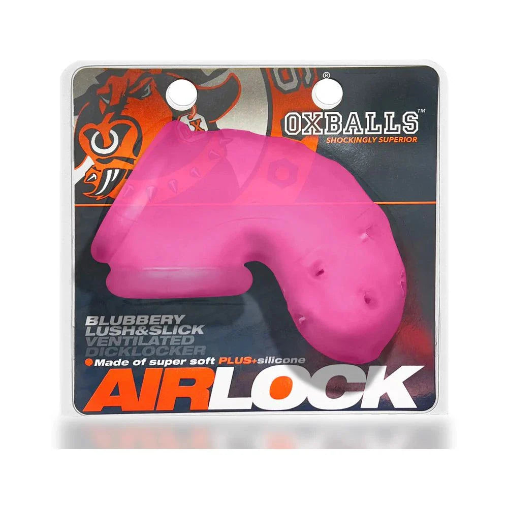 OxBalls Airlock Air-Lite vented chastity device in packaging with ventilation holes, showcasing its plus+SILICONE™ material and vibrant design.