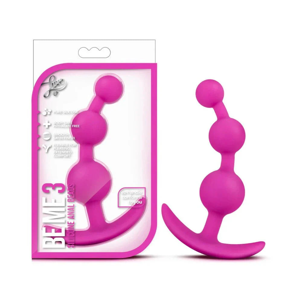 Luxe Be Me 3 Silicone Anal Beads Plug in pink with flexible, body-safe platinum silicone and ergonomic EZ handle for comfortable and stylish pleasure.