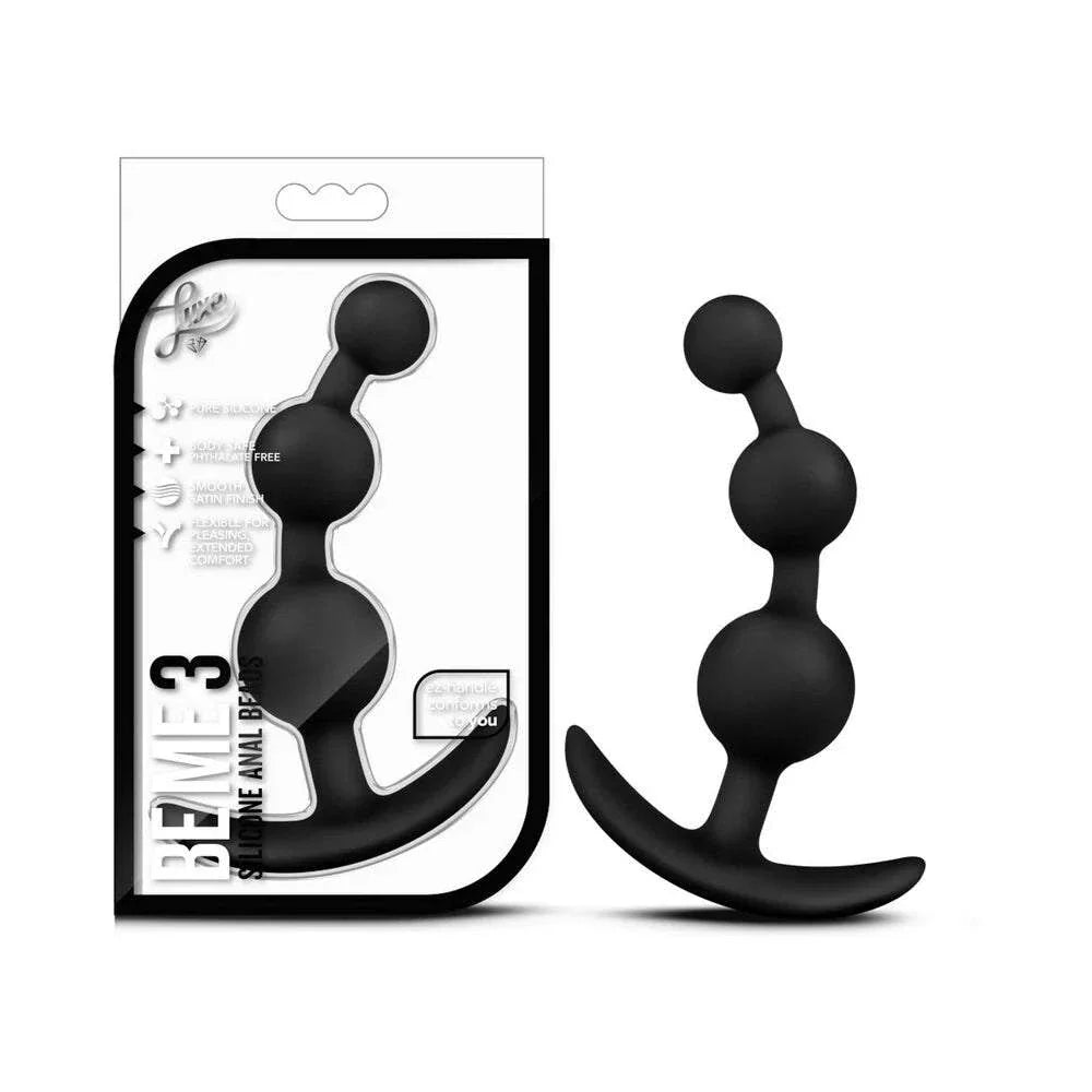 Luxe Be Me 3 Silicone Anal Beads Plug in black with three rounded beads and an ergonomic handle for comfortable and stylish pleasure.