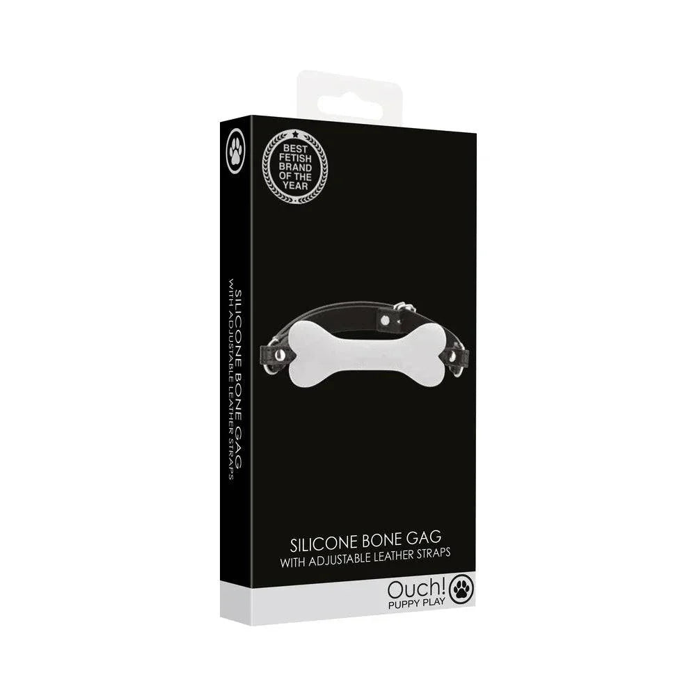 Ouch! Puppy Play Silicone Bone Gag in white, silicone bone-shaped gag with adjustable leather straps for bondage and puppy play.