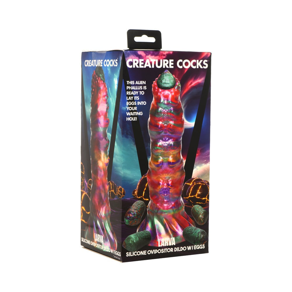 Creature Cocks Larva silicone ovipositor dildo with textured shaft, vibrant colors, larva eggs, suction cup base, and harness compatible packaging