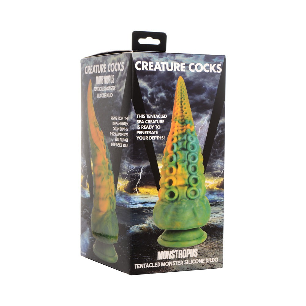 Creature Cocks Monstropus tentacled monster silicone dildo in marbled green, yellow, and blue with suction cup base.