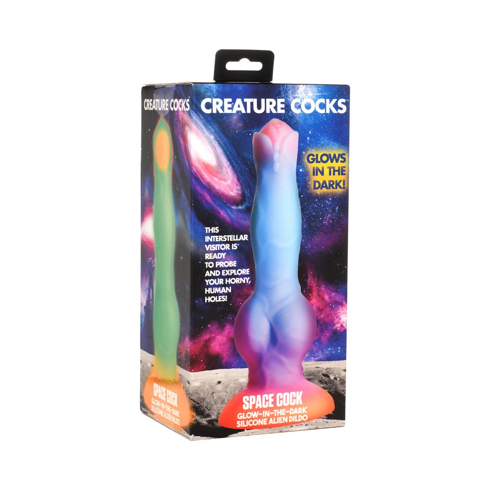 Creature Cocks Space Cock glow-in-the-dark silicone alien dildo with cosmic purple and blue design and suction cup base.