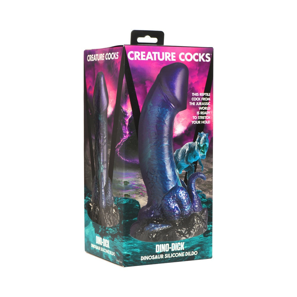 Creature Cocks Dino Dick large dinosaur-themed silicone dildo with suction base in glittering blue and purple colors