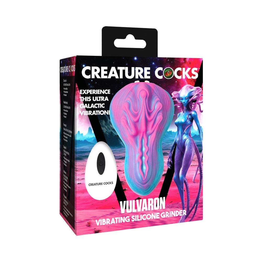 Creature Cocks Vulvaron vibrating silicone grinder with remote control in pink, teal, and purple alien design.