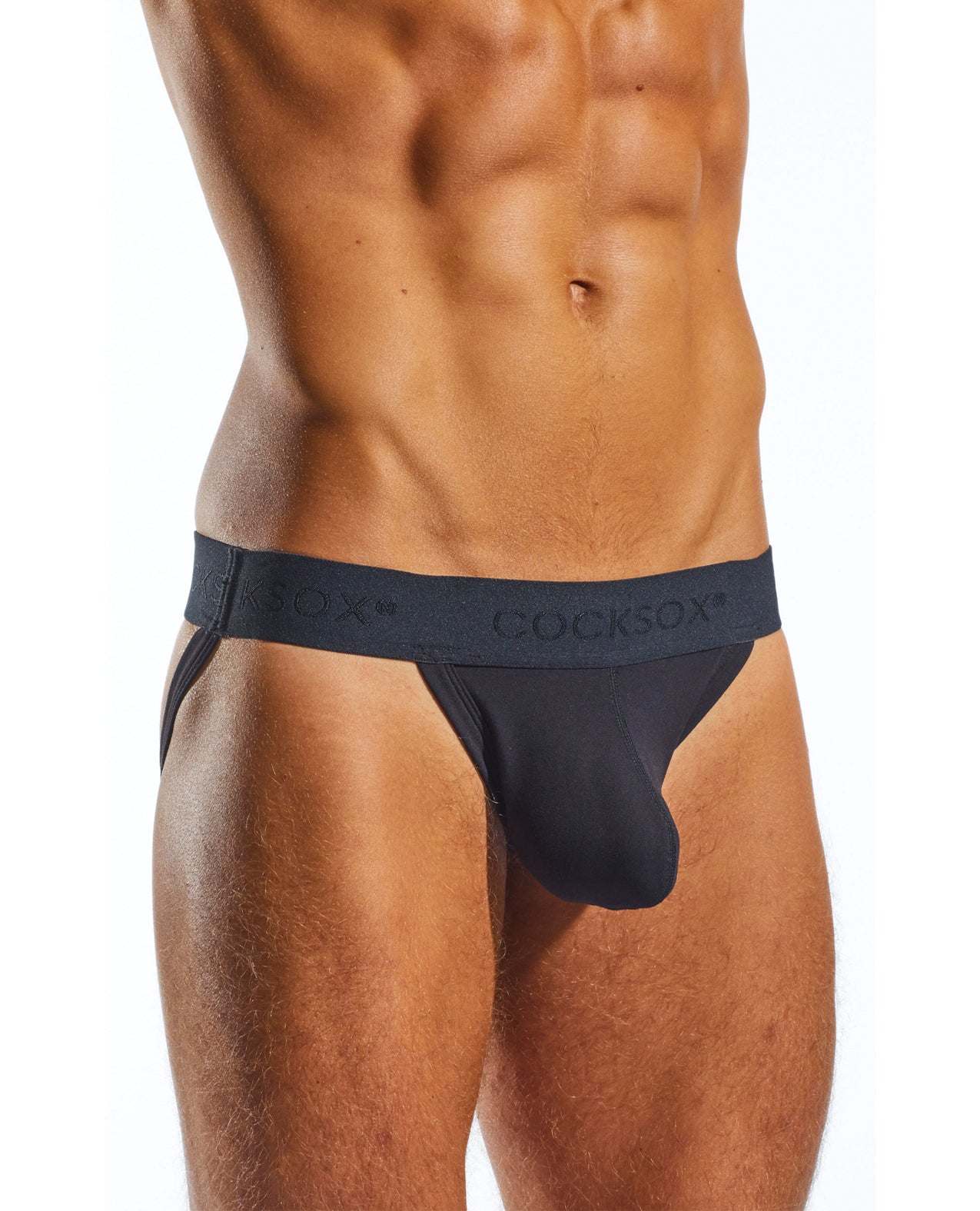 Male model wearing black Cocksox Enhancing Pouch Jockstrap with wide branded waistband in size large
