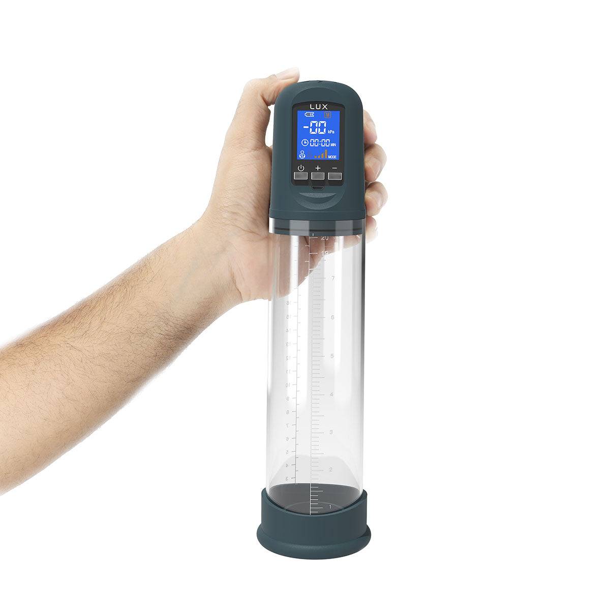 Hand holding LUX Active Volume rechargeable penis pump with digital display and transparent cylinder with measurement markings.
