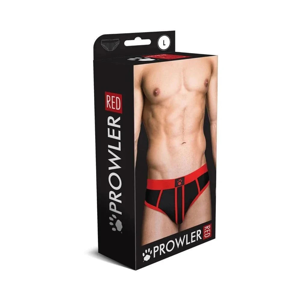 Prowler RED Assless Brief underwear in black and red with bold design, showing fit male torso on packaging.