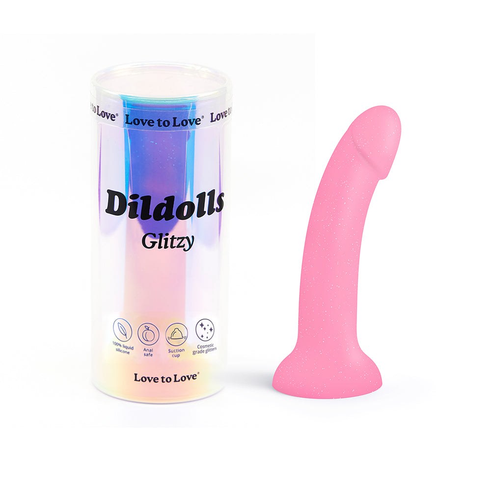 Pink glitter Love to Love Dildolls Glitzy 7-inch silicone dildo with suction cup and smooth curved design in transparent packaging