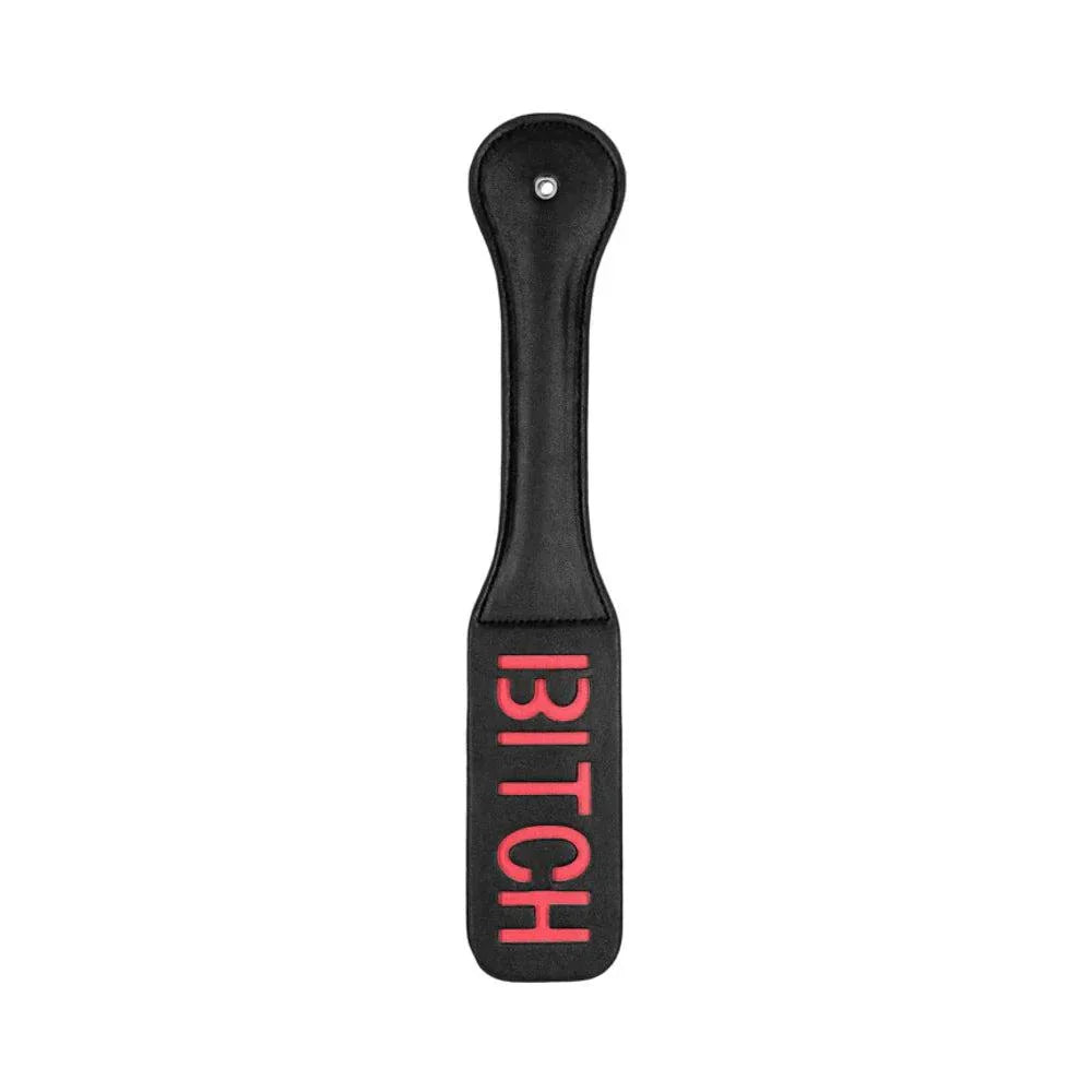 Black leather Ouch! 'Bitch' paddle with reversed red lettering and stitched edges