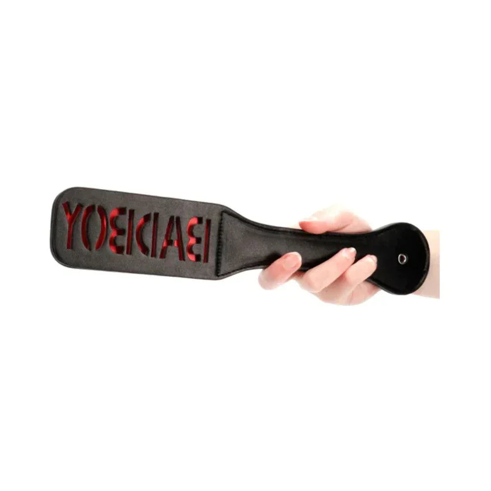 Ouch! 'Bad Boy' black leather paddle with reversed SPANK lettering for imprinting on skin