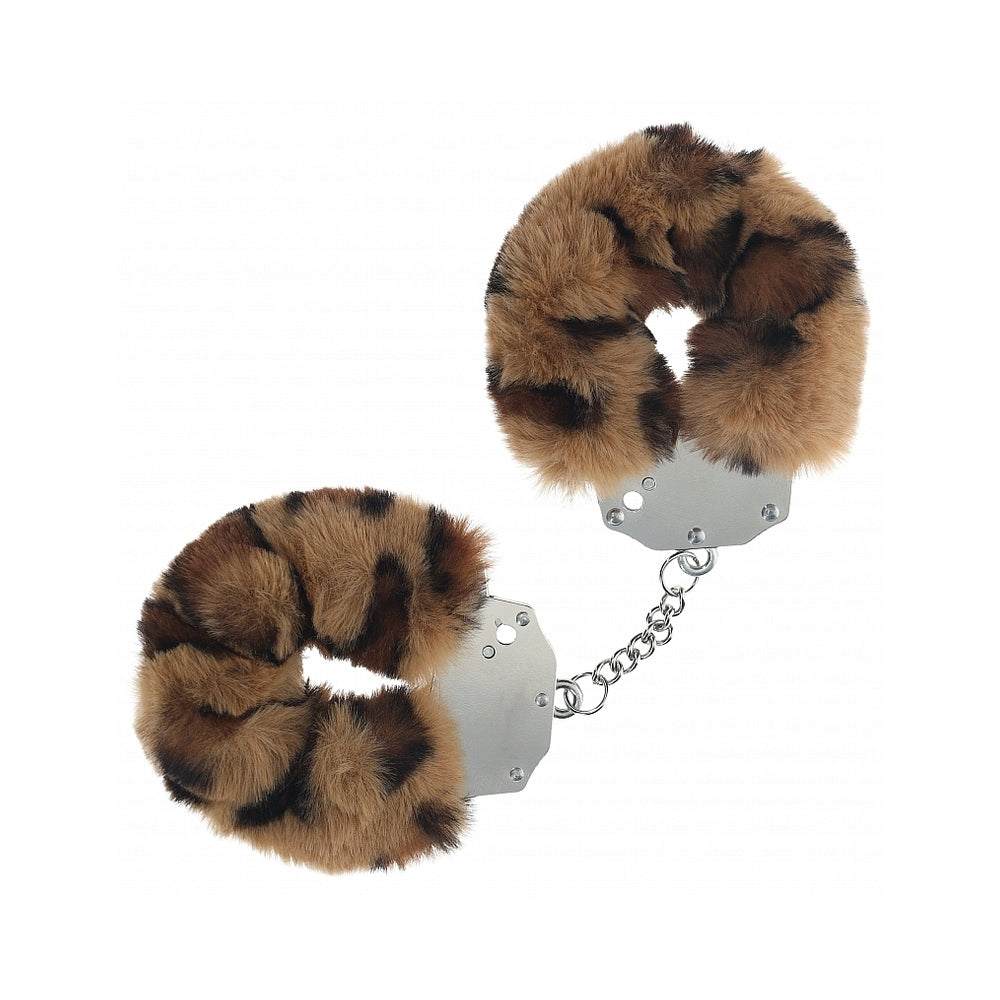 Heavy-duty fluffy handcuffs with soft brown and black fur covering durable metal cuffs and secured by a chain.