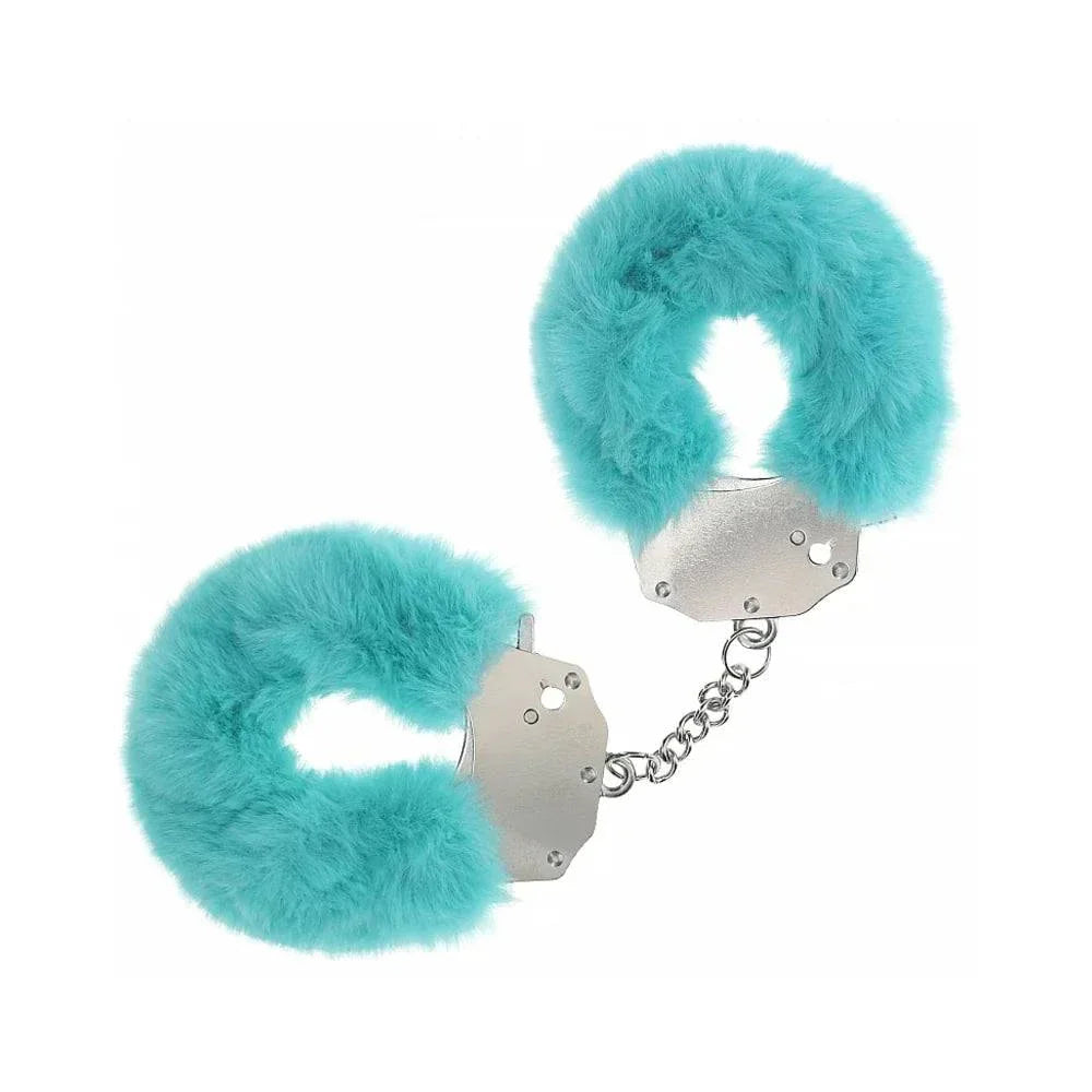 Heavy-duty fluffy handcuffs with soft turquoise fur and durable metal locking mechanism for comfortable and secure restraints.