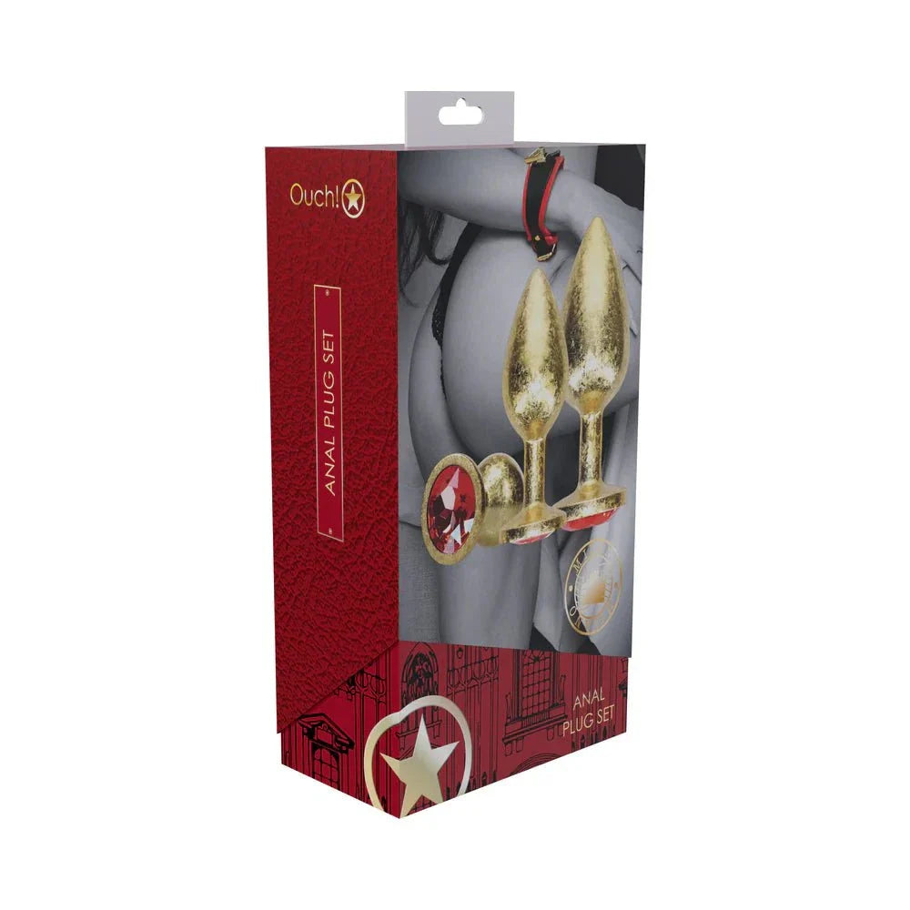 Ouch! International Milan Collection gold metal anal plug set with three jewel-encrusted bases in decorative packaging