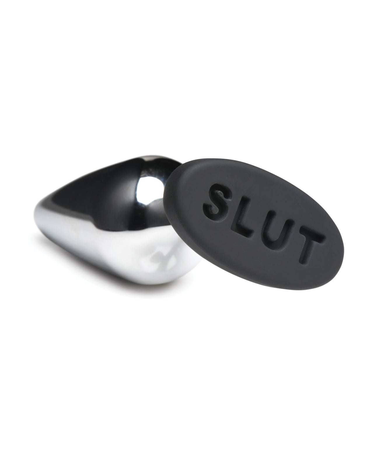 Master Series Butt Slut metal and black silicone butt plug with tapered metal insert and silicone base embossed with "SLUT" for safe and comfortable anal play.