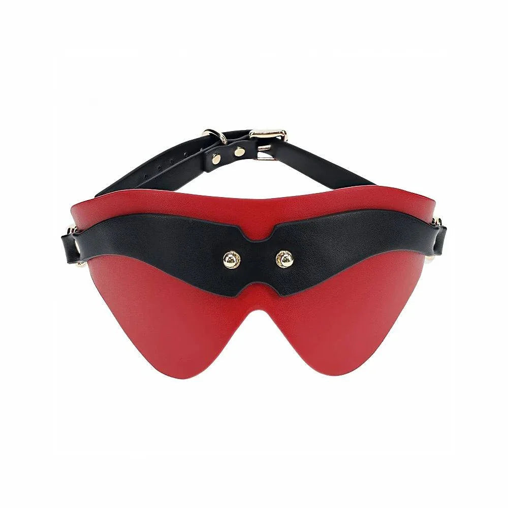 Ouch! International Milan Collection blindfold in red bonded leather with black adjustable strap and iridescent hardware detailing
