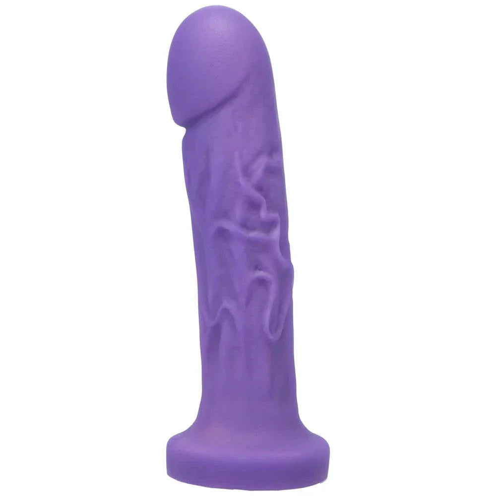 Tantus Goliath vibrating dildo kit in amethyst color with realistic ridges and powerful vibration