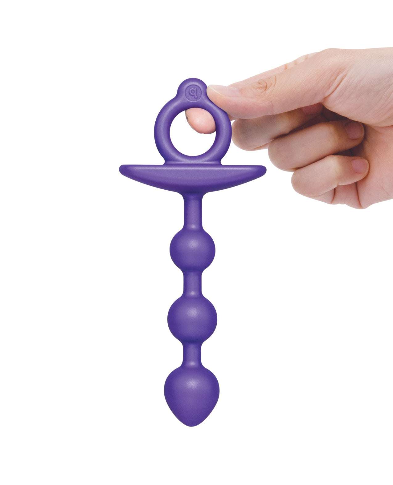 b-Vibe Zip Silicone Anal Beads in purple held by hand, featuring tapered silicone beads and finger ring handle for easy use.