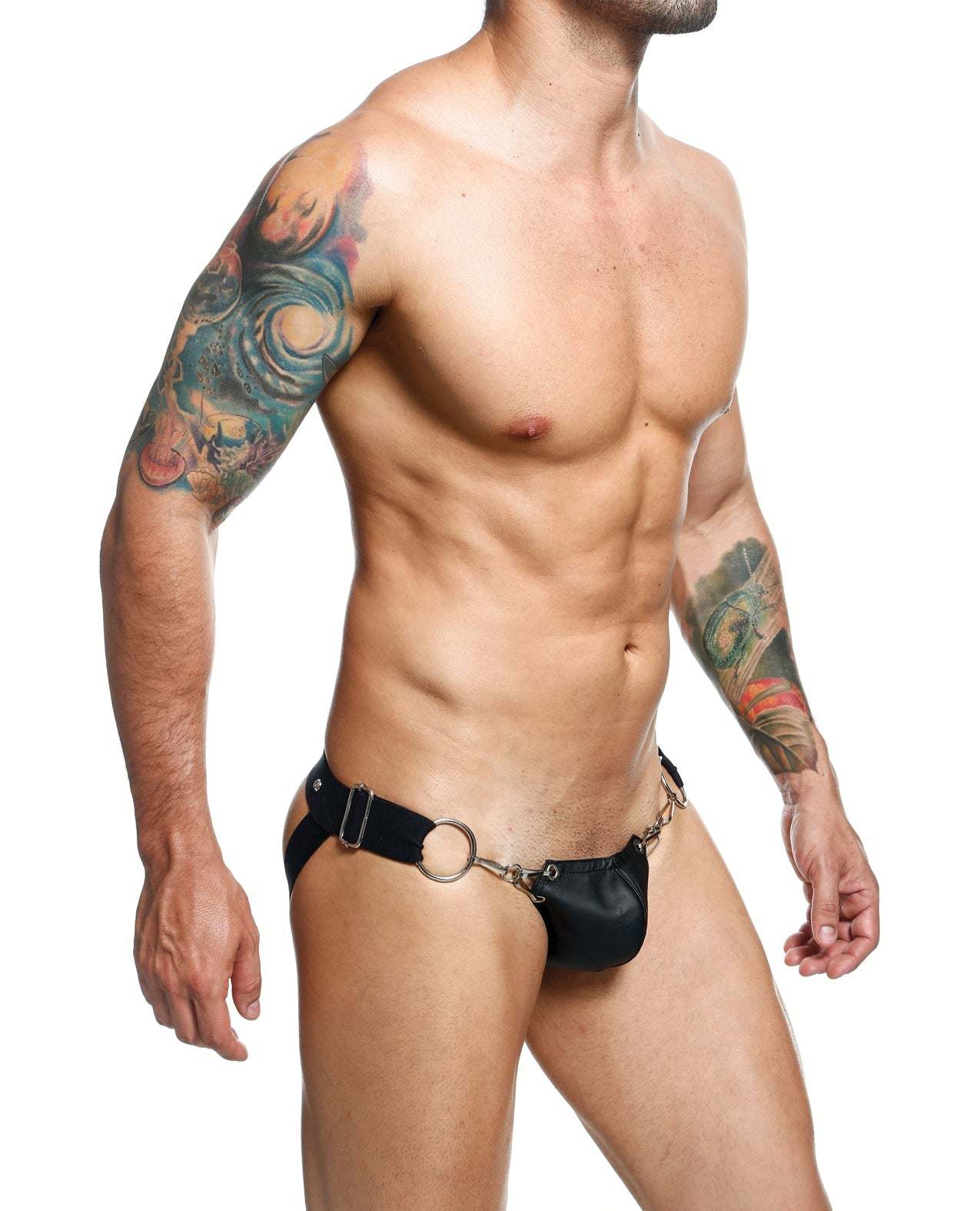 male model wearing black Dngeon Snap Jockstrap with chain-link pouch and wide straps