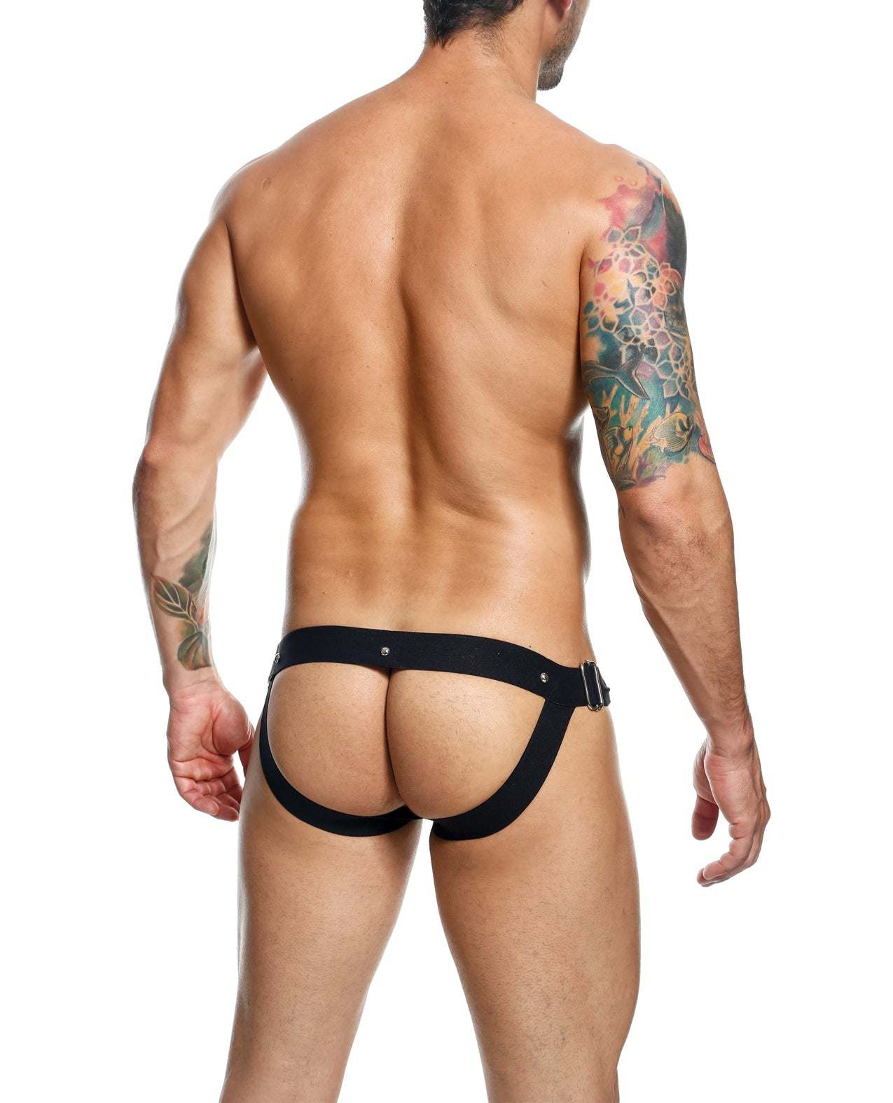 Rear view of a man wearing Dngeon Snap Jockstrap Black O/S with minimal back coverage and wide straps.