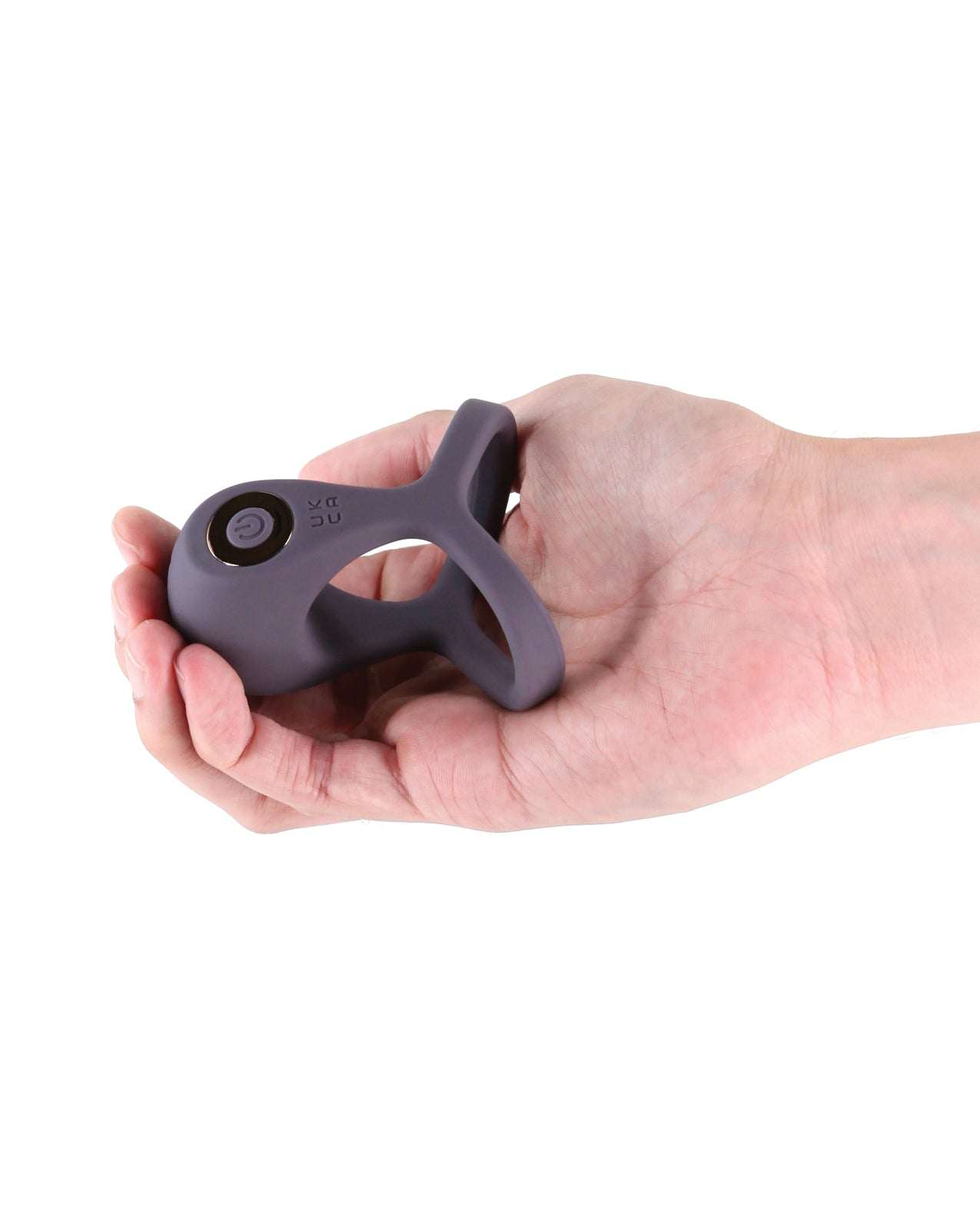 Renegade Valiant Vibrating Cock Ring in gray held in hand, made of body-safe silicone with ergonomic design.