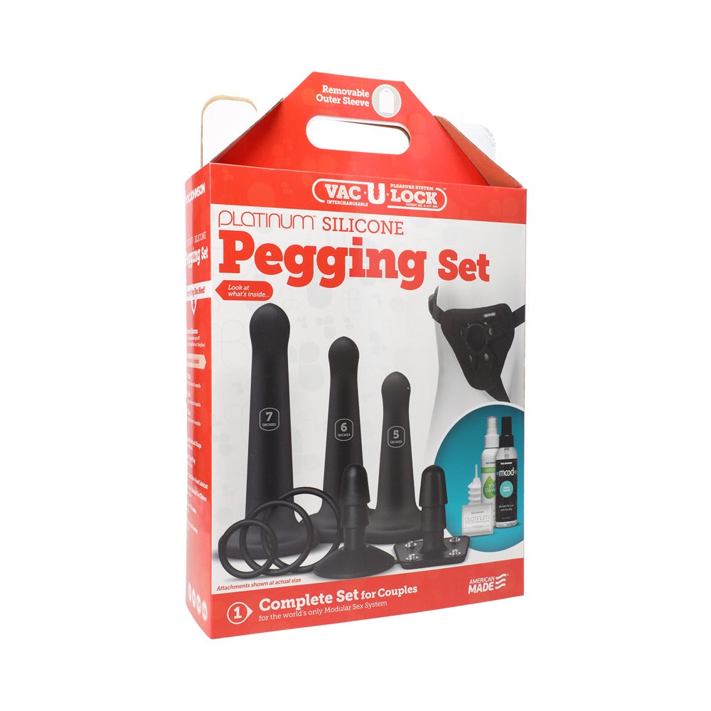Vac-U-Lock Silicone Pegging Set black with three silicone attachments, adjustable harness, lubricant, toy cleaner, and Vac-U powder.