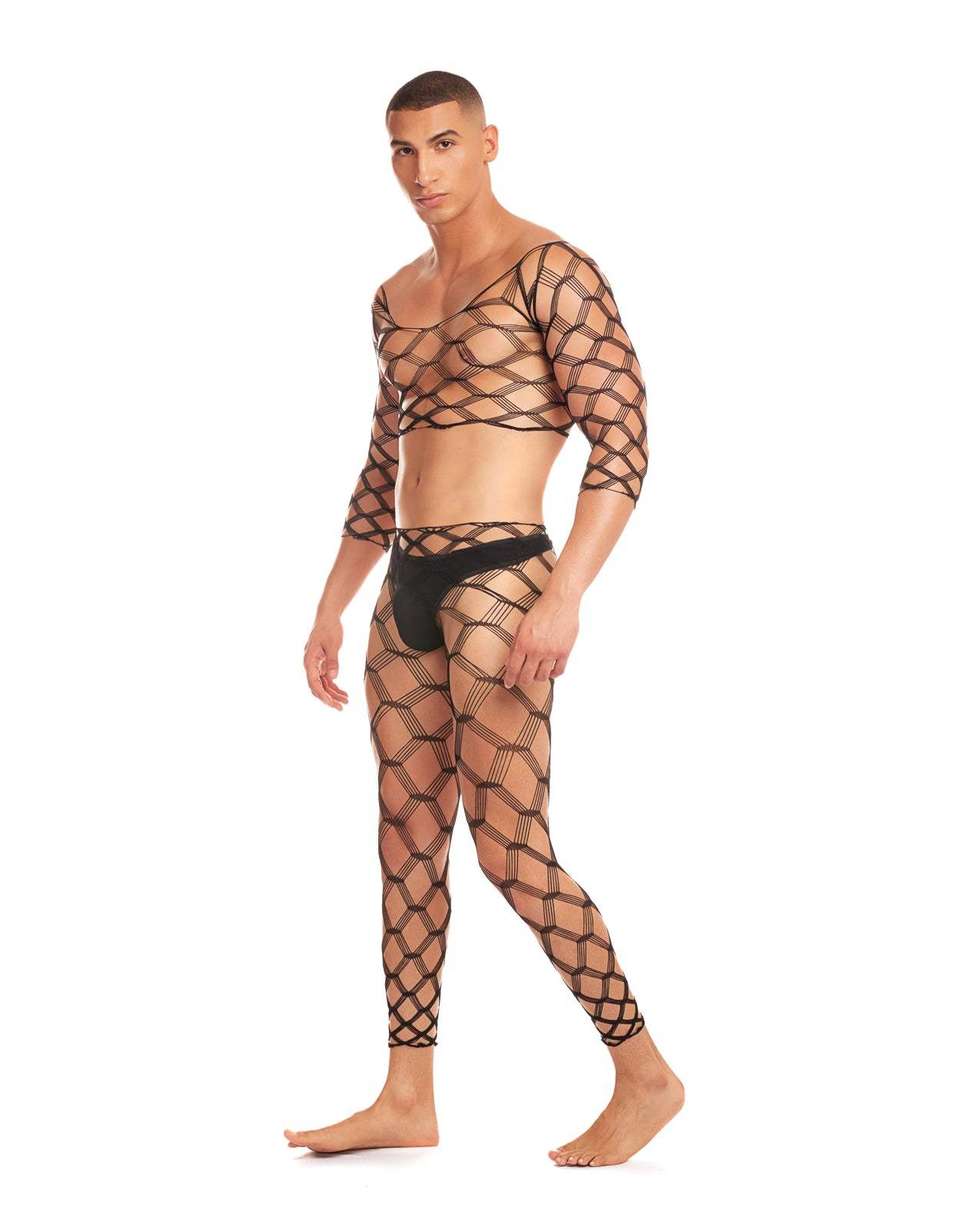 Man wearing black geometric patterned mesh Future Mode 3pc Set with crop top and leggings.