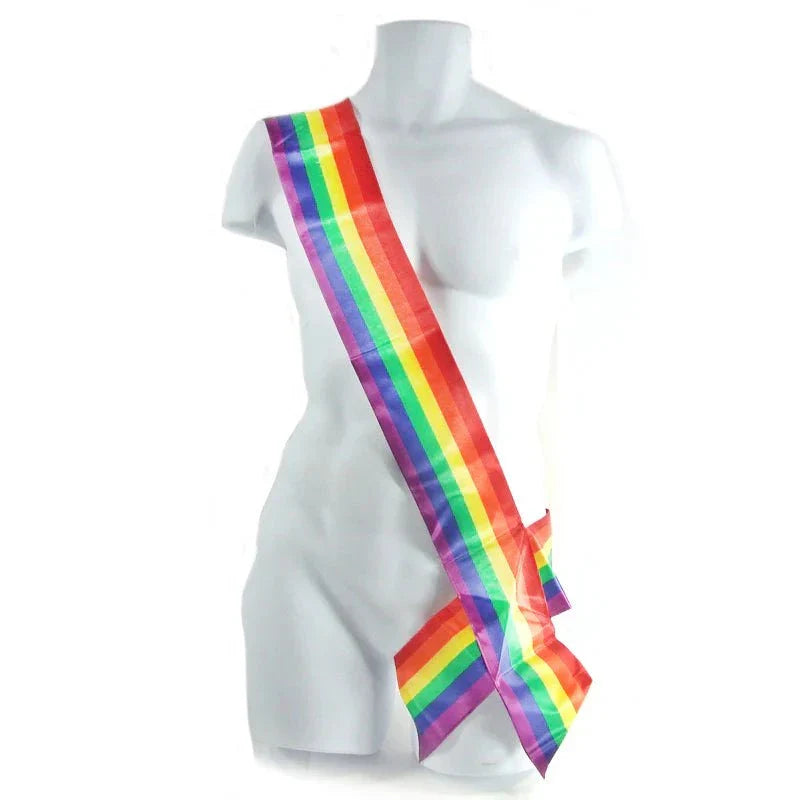 GaySentials Rainbow Sash with vibrant rainbow colors symbolizing LGBTQ+ pride and inclusivity, worn over the shoulder on a mannequin.