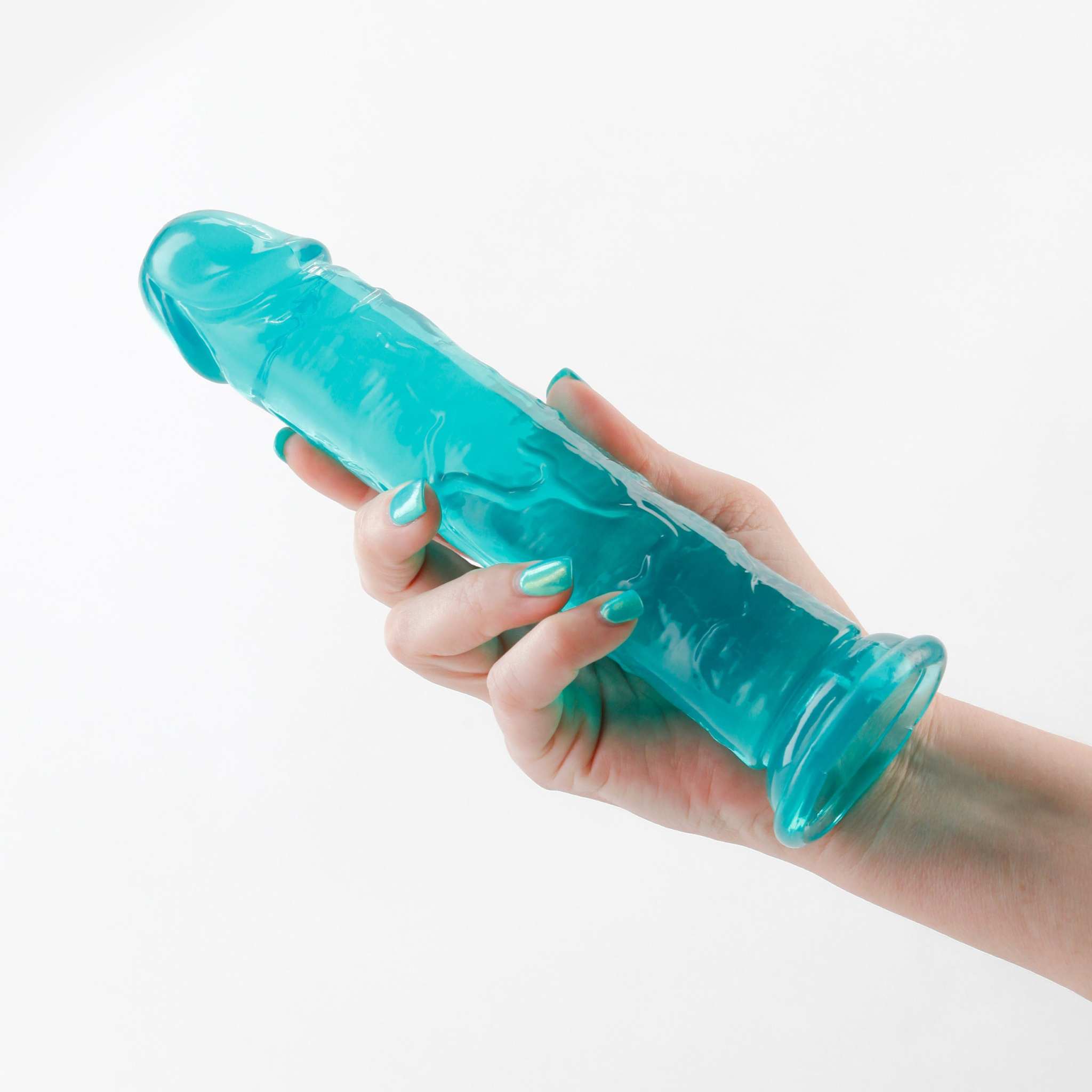 Hand holding Fantasia Upper 8 Inch teal flexible toy with suction cup base on white background