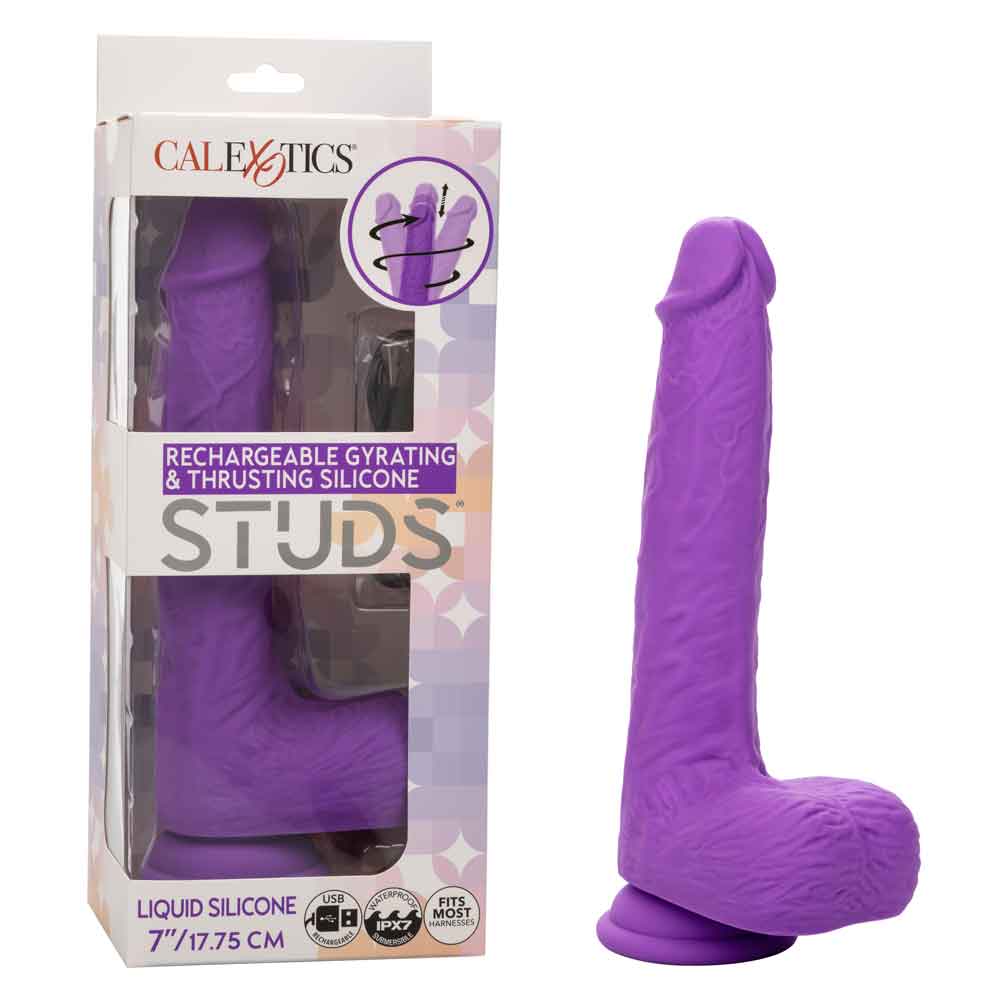 Purple rechargeable gyrating and thrusting silicone stud dildo with suction cup base and 7 inch length.