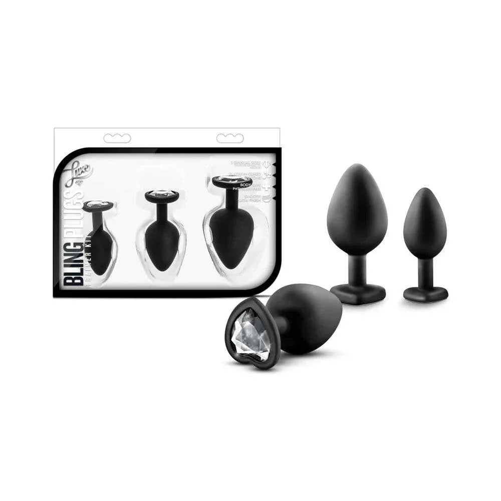 Luxe 3-piece black silicone plug training kit with white gem base and tapered tips for gradual anal play.