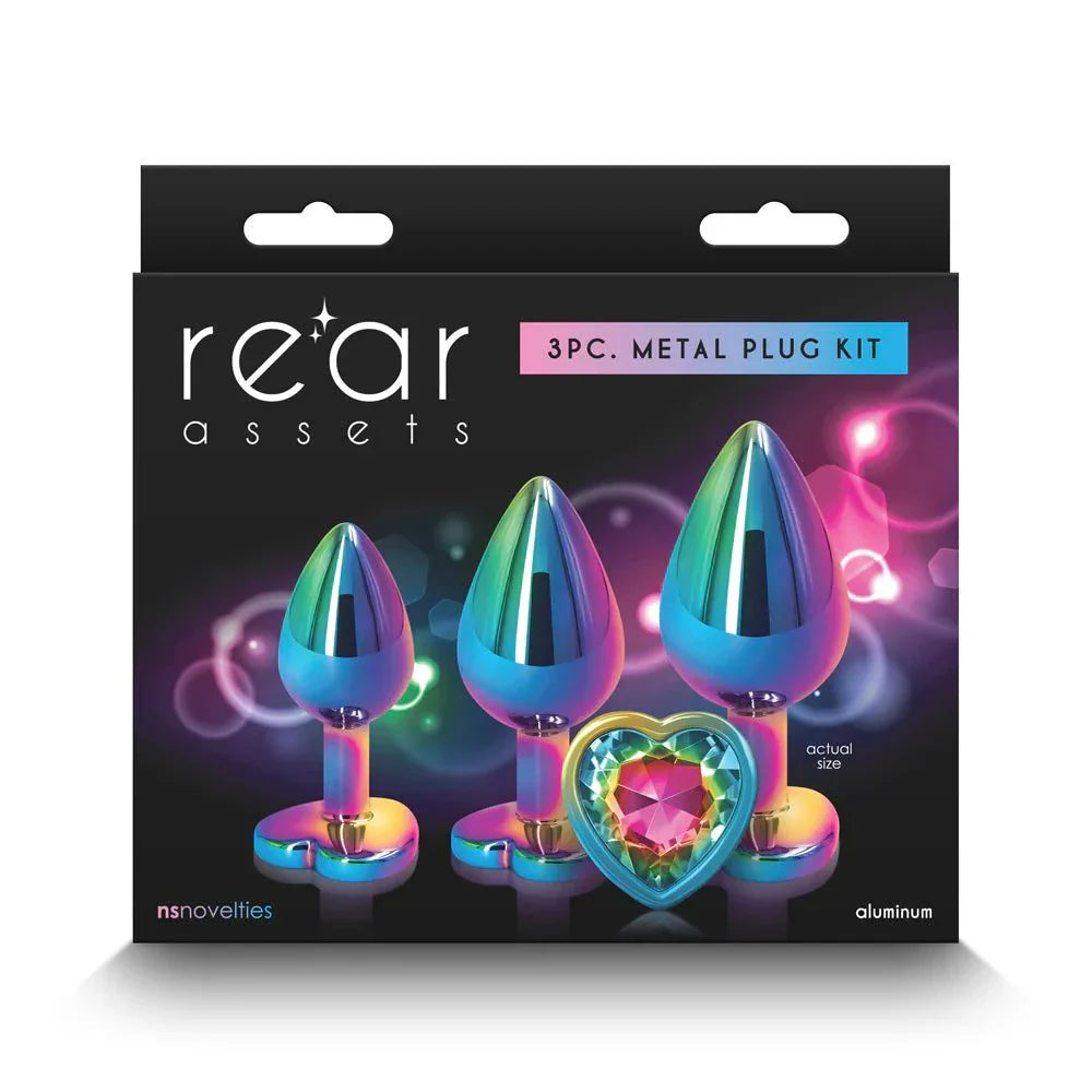 Rear Assets 3-piece multicolor metal plug kit with rainbow heart design, aluminum anal plugs in graduated sizes for training and pleasure
