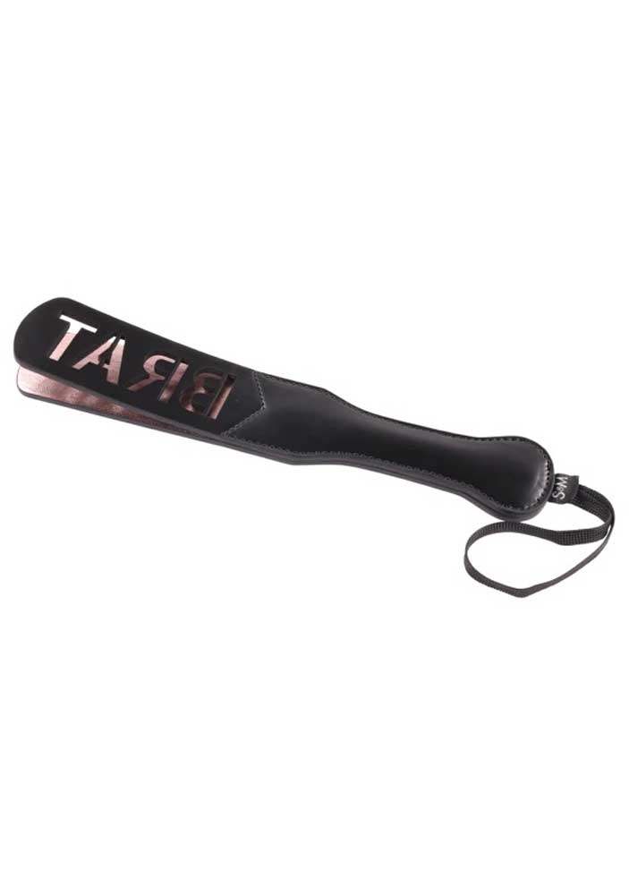 Black and Rose Gold Brat Paddle with wrist loop and "BRAT" imprint for playful adventures.