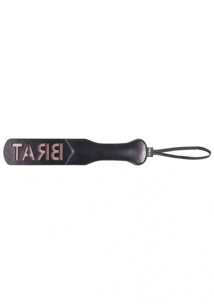 Black and Rose Gold Brat Paddle with "BRAT" imprint, faux leather design, and practical wrist loop for playful adventures.