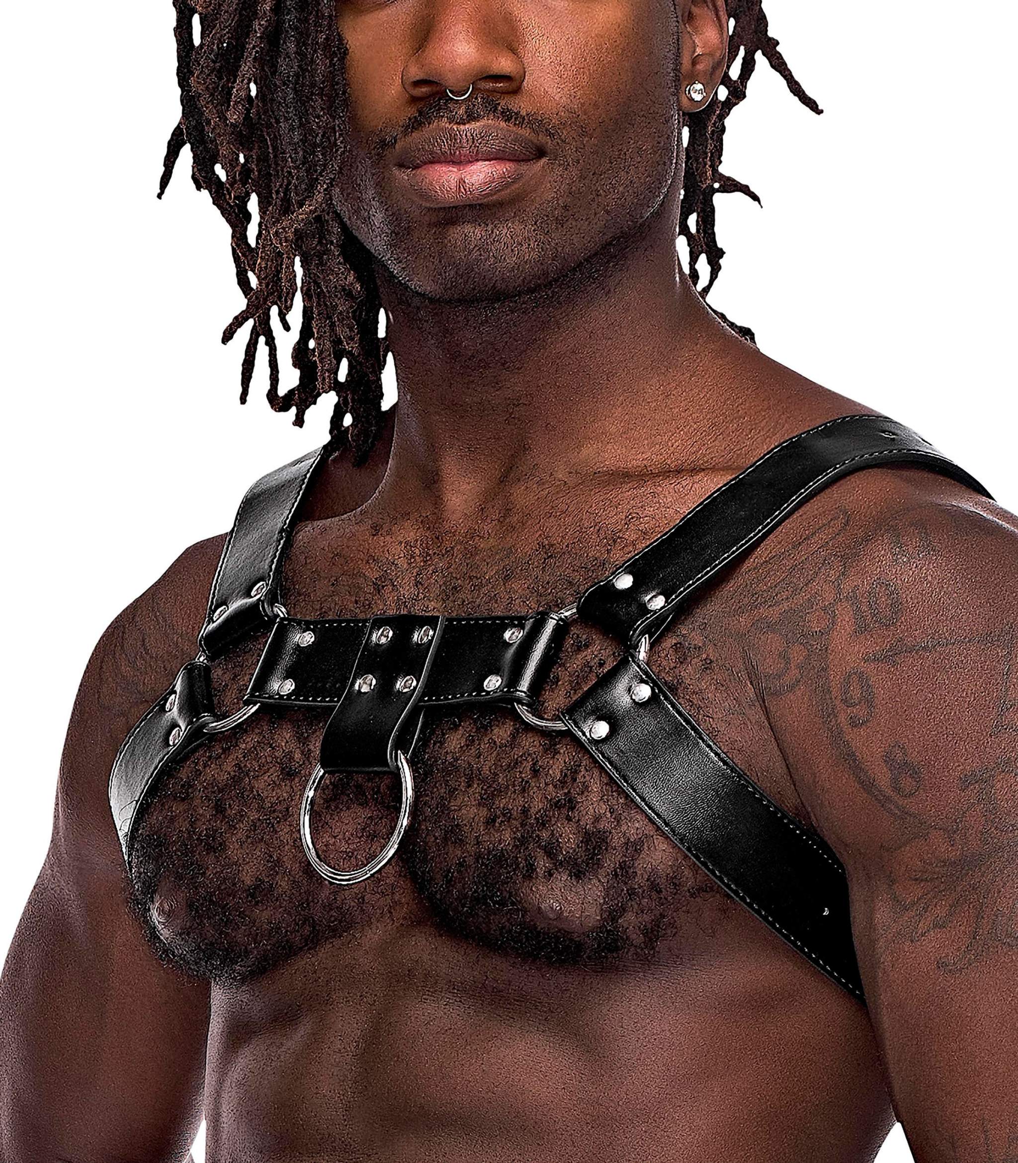 Aries Leather Harness in black with adjustable metal buckles and decorative studding, worn by a model.