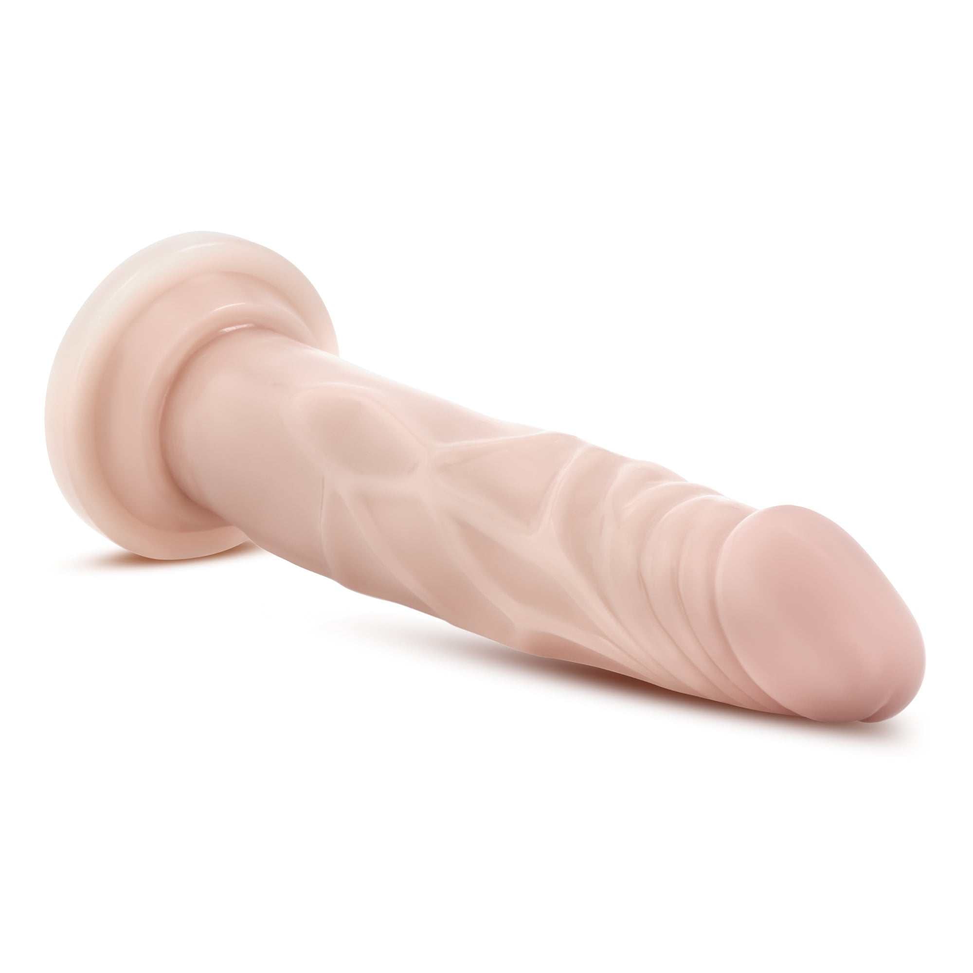 Dr. Skin realistic dildo in beige with suction cup base, 7.5 inches, flexible and harness compatible.