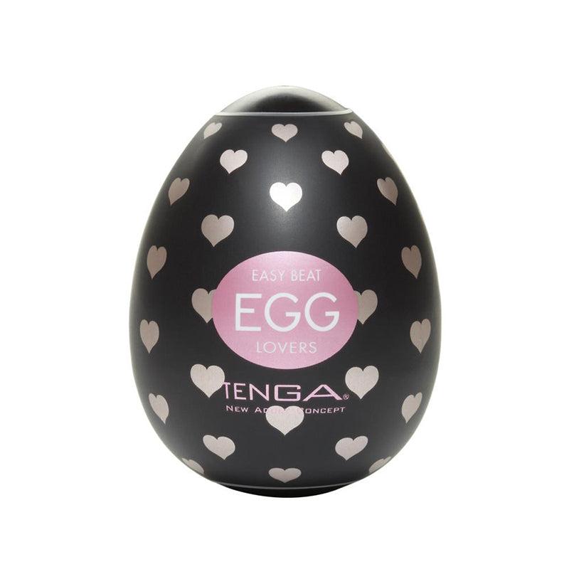 Black Tenga EGG Lovers male pleasure toy with white hearts and pink logo on packaging