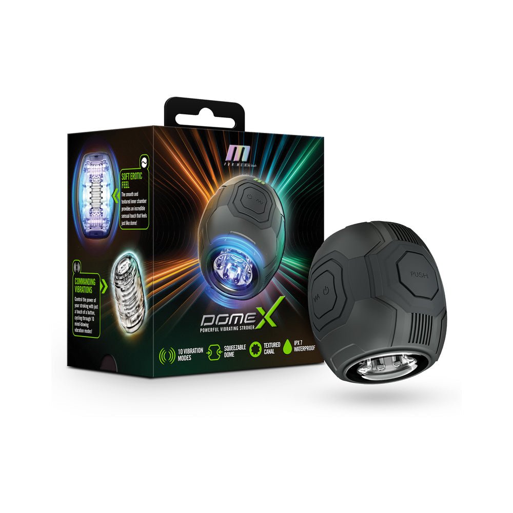 M for Men Dome X black vibrating male masturbator with textured chamber and waterproof design next to product packaging