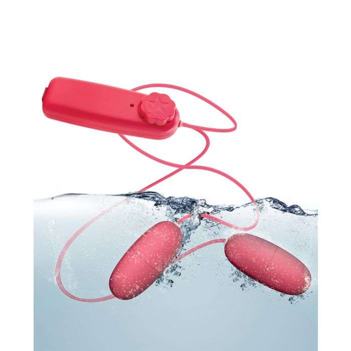 Blush B Yours Double Pop Eggs in cerise with wired controller submerged in water showing water-resistant design