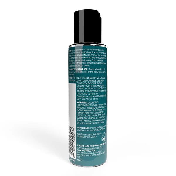 Bottle of Dynamo Lube Silicone Formula 4.4oz showing product information and instructions on label