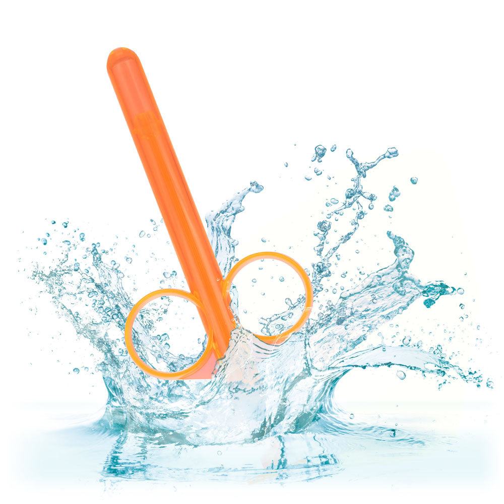 Orange Lube Tube with ergonomic finger loops splashing in water for precise lubrication application