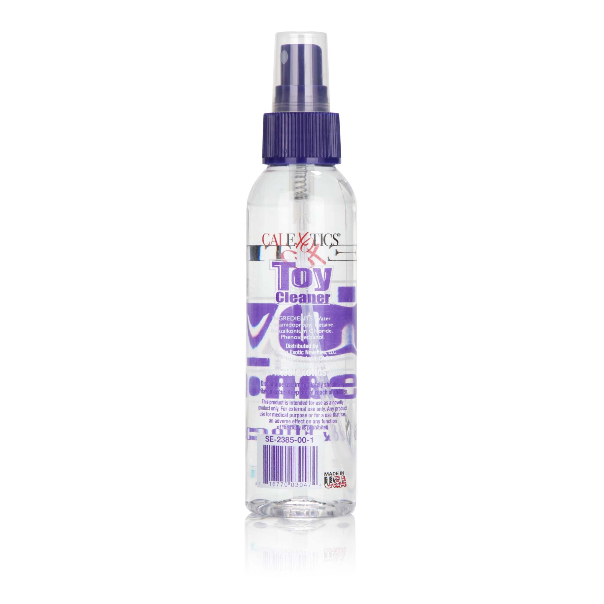 Clear 4.3 fl. oz. Universal Toy Cleaner spray bottle with purple nozzle and label for maintaining adult toy hygiene and safety.