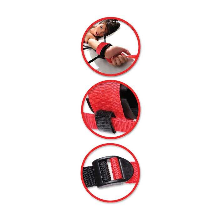 Fetish Fantasy Web bed restraint system with adjustable red nylon straps and neoprene cuffs for bondage play