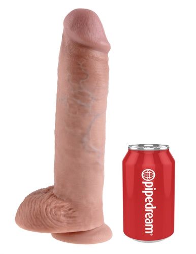 King Cock 11-Inch realistic flesh dildo with textured shaft, veins, balls, and suction cup base next to a soda can for size comparison