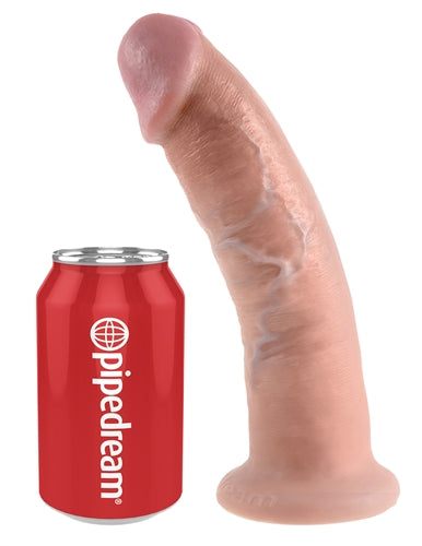 King Cock 9-inch realistic flesh dildo with suction cup base next to soda can for size comparison