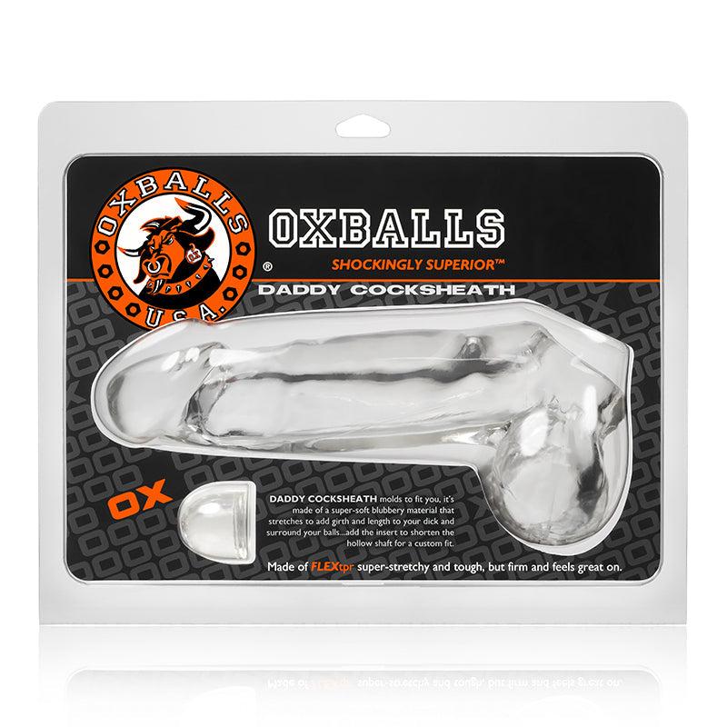 Clear OxBalls Daddy Cocksheath cock sleeve in black and orange packaging for intimate enhancement
