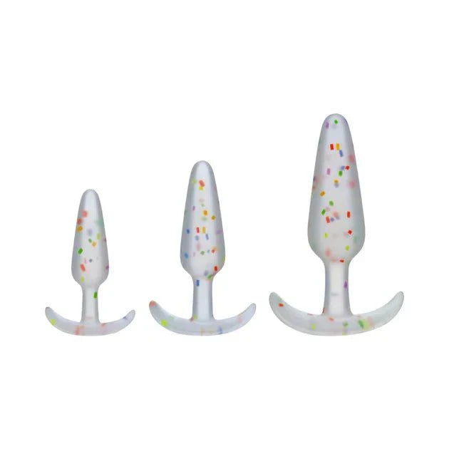 Mood Pride Anal Plug 3-piece set in rainbow confetti silicone with tapered tips and curved bases for comfortable anal training.