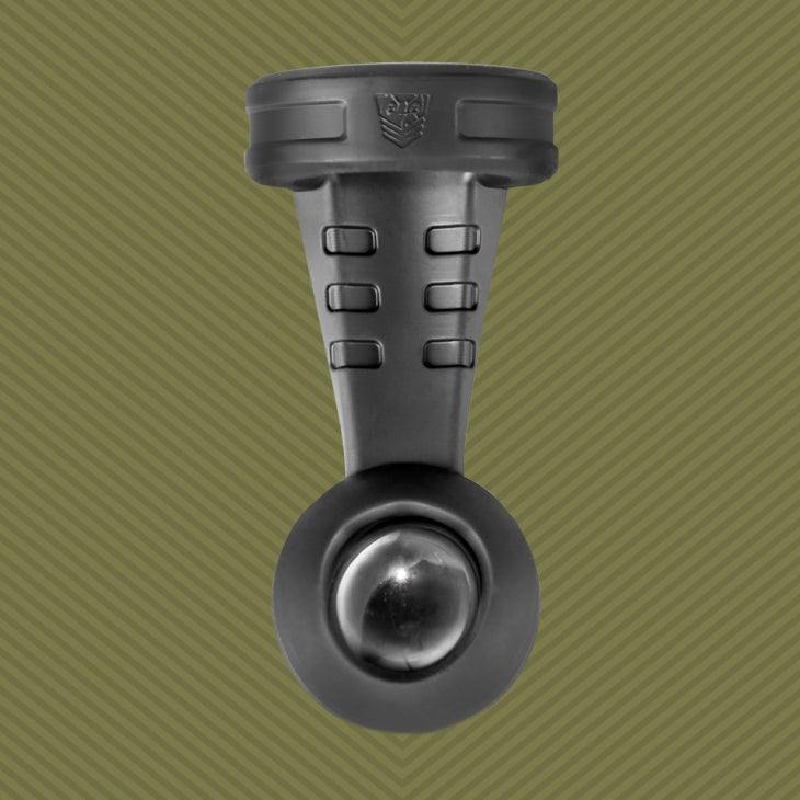 Fort Troff Swing N' Hang Black adult toy on a green background.