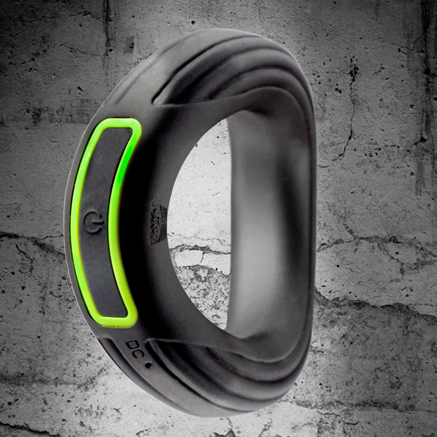 Large black Fort Troff Rev Cock Throbber with dual engines and green accents for enhanced pleasure.