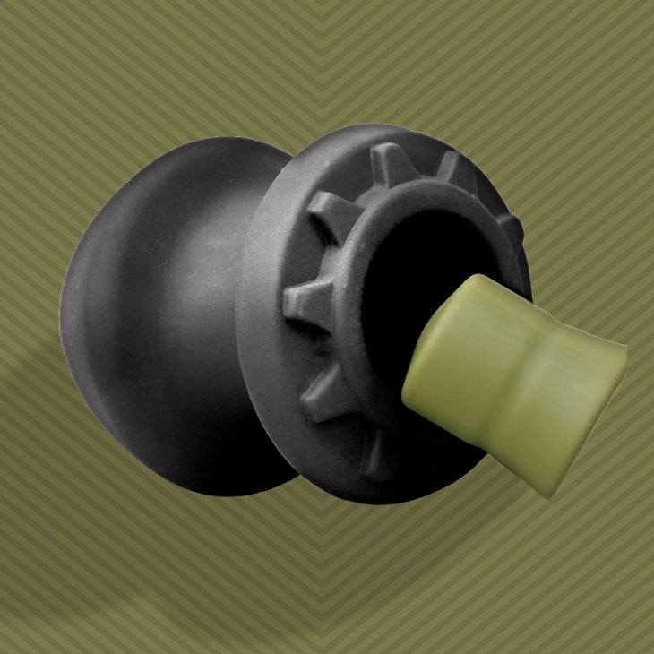 Fort Troff Kum Keeper large, medium, and small black silicone storage containers with removable stopper.